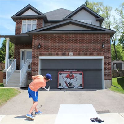 Outside Garage (The SportScreen 16FT Manual Screen w/ Target)