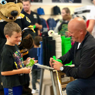 Pure Hockey Associate Taping Hockey Stick For Young Child